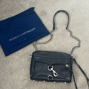 Rebecca Minkoff navy leather crossbody with silver details.